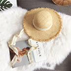 Lucifer’s Summer Elegance – Raffia Straw Hat with Ribbon Bow Beach Style UK